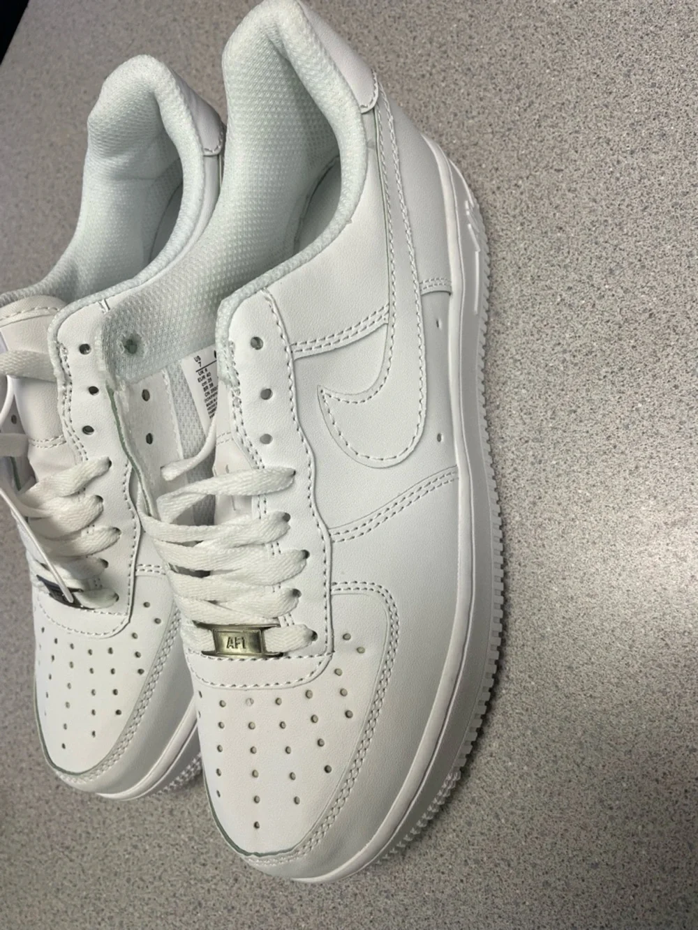 Nike All-White Leather Low-Top Sneakers